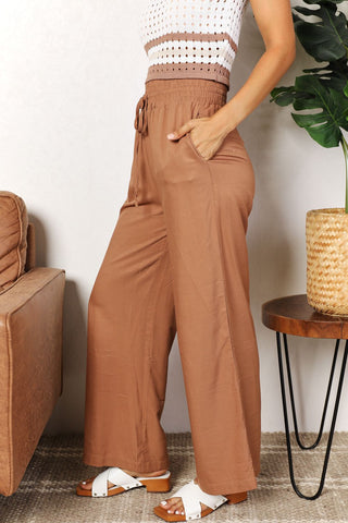 Shop Double Take Drawstring Smocked Waist Wide Leg Pants - High-Quality U.S. Made Women’s Fashion with Free & Fast Shipping