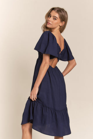 Shop Navy J.NNA Smocked Bow Back Ruffle Hem Dress - High-Quality U.S. Made Women’s Fashion with Free & Fast Shipping