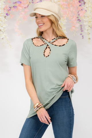 Shop Sage Celeste Full Size Crisscross Cutout Leopard Contrast Trim T-Shirt - High-Quality U.S. Made Women’s Fashion with Free & Fast Shipping