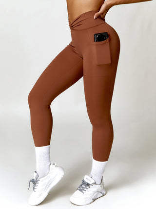 Shop Brown Twisted High Waist Active Pants with Pockets - High-Quality U.S. Made Women’s Fashion with Free & Fast Shipping