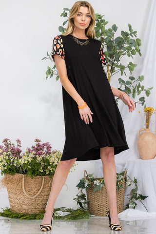 Shop Celeste Full Size Leopard Short Sleeve Dress with Pockets - High-Quality U.S. Made Women’s Fashion with Free & Fast Shipping