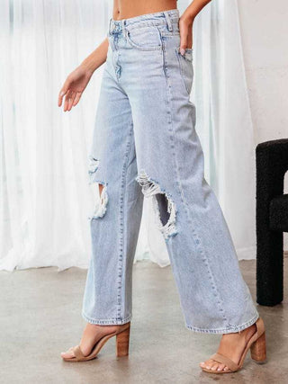 Shop Distressed Wide Leg Jeans with Pockets - High-Quality U.S. Made Women’s Fashion with Free & Fast Shipping