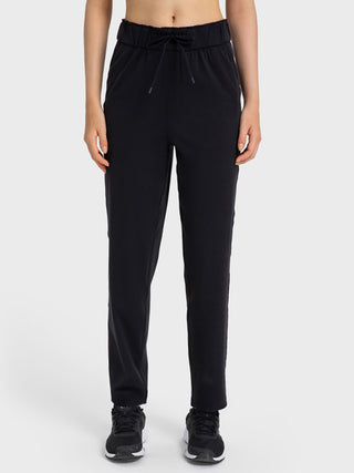 Shop Black Drawstring Sport Pants with Pockets - High-Quality U.S. Made Women’s Fashion with Free & Fast Shipping