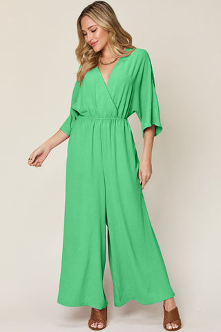 Shop Double Take Full Size Surplice Wide Leg Jumpsuit with Pockets - High-Quality U.S. Made Women’s Fashion with Free & Fast Shipping