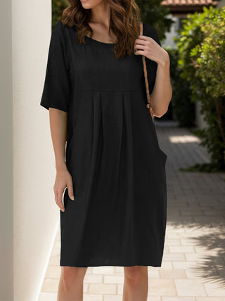 Shop Full Size Round Neck Half Sleeve Dress with Pockets - High-Quality U.S. Made Women’s Fashion with Free Fast Shipping