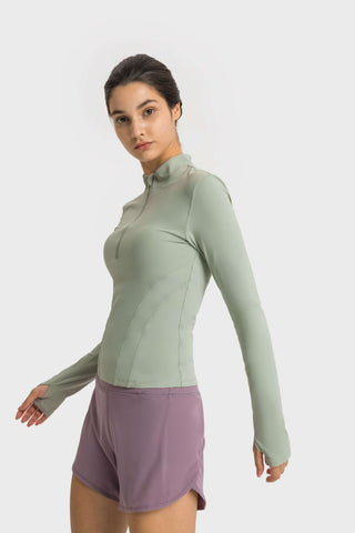 Shop Millennia Half Zip Thumbhole Sleeve Sports Top - High-Quality U.S. Made Women’s Fashion with Free & Fast Shipping