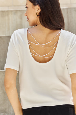 Shop And The Why Pearly White Full Size Criss Cross Pearl Detail Open Back T-Shirt - High-Quality U.S. Made Women’s Fashion with Free & Fast Shipping