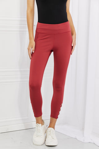 Shop Yelete Ready For Action Full Size Ankle Cutout Active Leggings in Brick Red - High-Quality U.S. Made Women’s Fashion with Free & Fast Shipping