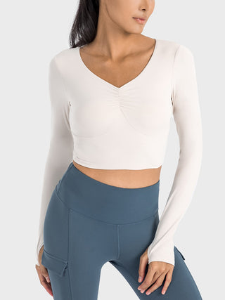 Shop White Millennia Ruched Cropped Long Sleeve Sports Top - High-Quality U.S. Made Women’s Fashion with Free & Fast Shipping