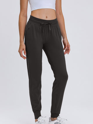 Shop Dark Gray Double Take Tied Joggers with Pockets - High-Quality U.S. Made Women’s Fashion with Free & Fast Shipping