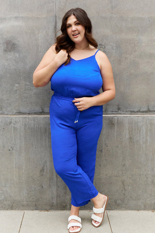 Shop ODDI Full Size Textured Woven Jumpsuit in Royal Blue - High-Quality U.S. Made Women’s Fashion with Free & Fast Shipping