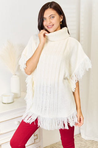 Shop Ivory One Size Justin Taylor Turtle Neck Fringe Poncho - High-Quality U.S. Made Women’s Fashion with Free & Fast Shipping