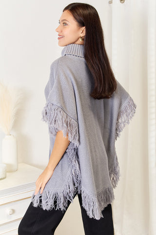 Shop Justin Taylor Turtle Neck Fringe Poncho - High-Quality U.S. Made Women’s Fashion with Free & Fast Shipping