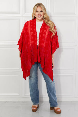 Shop Justin Taylor Pom-Pom Asymmetrical Poncho Cardigan in Red - High-Quality U.S. Made Women’s Fashion with Free & Fast Shipping