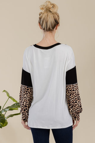 Shop Celeste Full Size Leopard Color Block Exposed Seam T-Shirt - High-Quality U.S. Made Women’s Fashion with Free & Fast Shipping