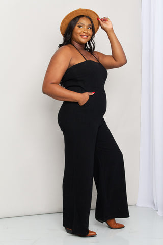 Shop White Birch Full Size Halter Neck Wide Leg Jumpsuit with Pockets - High-Quality U.S. Made Women’s Fashion with Free & Fast Shipping