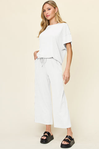 Shop Double Take Full Size Texture Round Neck Short Sleeve T-Shirt and Wide Leg Pants - High-Quality U.S. Made Women’s Fashion with Free Fast Shipping