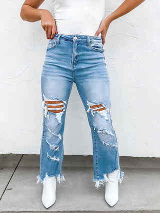 Shop Distressed Raw Hem Jeans with Pockets - High-Quality U.S. Made Women’s Fashion with Free & Fast Shipping