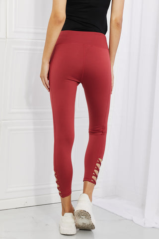 Shop Yelete Ready For Action Full Size Ankle Cutout Active Leggings in Brick Red - High-Quality U.S. Made Women’s Fashion with Free & Fast Shipping