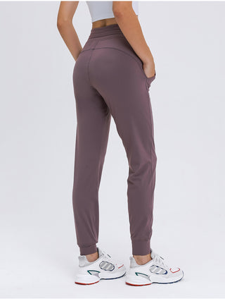 Shop Double Take Tied Joggers with Pockets - High-Quality U.S. Made Women’s Fashion with Free & Fast Shipping