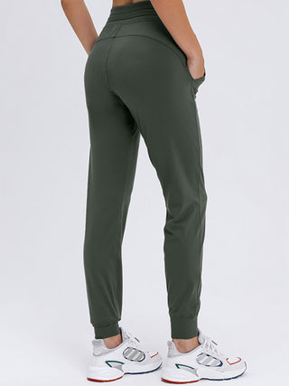 Shop Double Take Tied Joggers with Pockets - High-Quality U.S. Made Women’s Fashion with Free & Fast Shipping