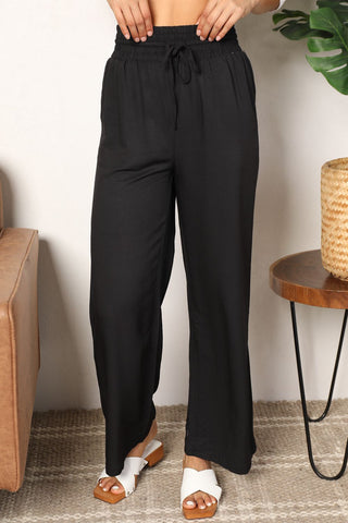 Shop Black Double Take Drawstring Smocked Waist Wide Leg Pants - High-Quality U.S. Made Women’s Fashion with Free & Fast Shipping