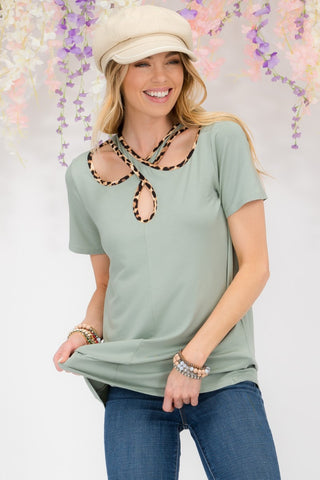 Shop Celeste Full Size Crisscross Cutout Leopard Contrast Trim T-Shirt - High-Quality U.S. Made Women’s Fashion with Free & Fast Shipping