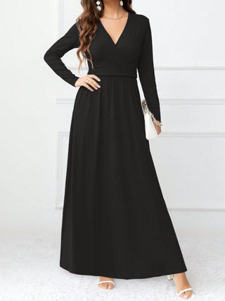 Shop Black Pocketed Surplice Long Sleeve Maxi Dress - High-Quality U.S. Made Women’s Fashion with Free & Fast Shipping