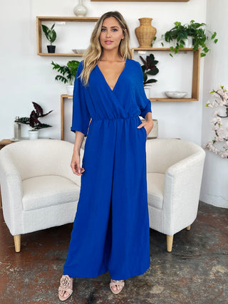 Shop Double Take Full Size Surplice Wide Leg Jumpsuit with Pockets - High-Quality U.S. Made Women’s Fashion with Free & Fast Shipping