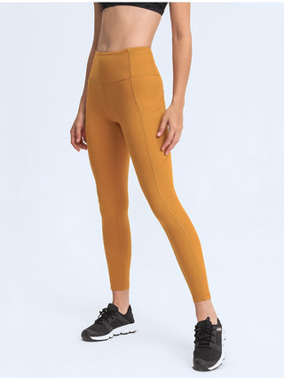 Shop Tangerine Wide Waistband Leggings with Pockets - High-Quality U.S. Made Women’s Fashion with Free & Fast Shipping