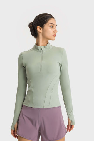 Shop Green Millennia Half Zip Thumbhole Sleeve Sports Top - High-Quality U.S. Made Women’s Fashion with Free & Fast Shipping