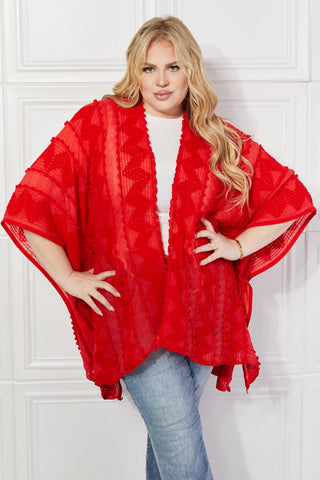 Shop Justin Taylor Pom-Pom Asymmetrical Poncho Cardigan in Red - High-Quality U.S. Made Women’s Fashion with Free & Fast Shipping