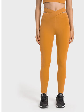 Shop Mustard Crisscross Cutout Sports Leggings - High-Quality U.S. Made Women’s Fashion with Free & Fast Shipping