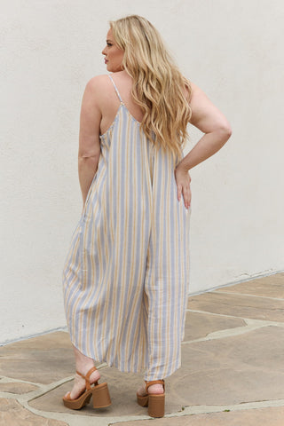 Shop HEYSON Full Size Multi Colored Striped Jumpsuit with Pockets - High-Quality U.S. Made Women’s Fashion with Free & Fast Shipping