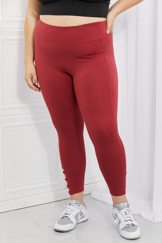 Shop Brick Red Yelete Ready For Action Full Size Ankle Cutout Active Leggings in Brick Red - High-Quality U.S. Made Women’s Fashion with Free & Fast Shipping