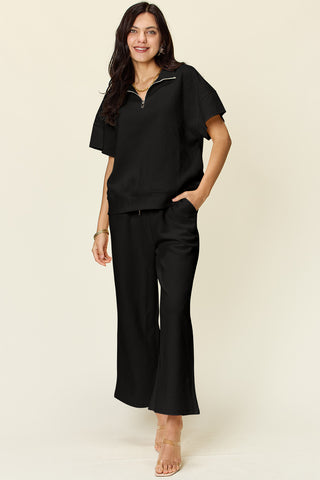 Shop Black Double Take Full Size Texture Half Zip Short Sleeve Top and Pants Set - High-Quality U.S. Made Women’s Fashion with Free & Fast Shipping