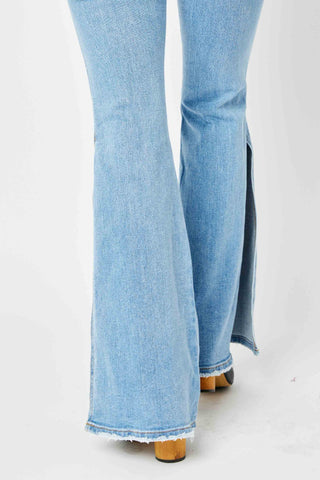 Shop Judy Blue Full Size Mid Rise Raw Hem Slit Flare Jeans - High-Quality U.S. Made Women’s Fashion with Free & Fast Shipping