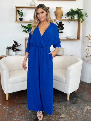 Shop Double Take Full Size Surplice Wide Leg Jumpsuit with Pockets - High-Quality U.S. Made Women’s Fashion with Free & Fast Shipping