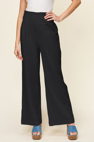 Shop Black Double Take Full Size Texture Smocked Waist Wide Leg Pants - High-Quality U.S. Made Women’s Fashion with Free & Fast Shipping