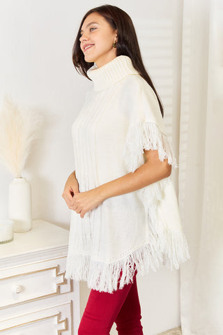 Shop Justin Taylor Turtle Neck Fringe Poncho - High-Quality U.S. Made Women’s Fashion with Free & Fast Shipping