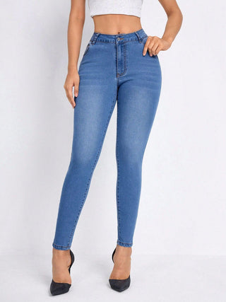 Shop Medium High Rise Skinny Jeans with Pockets - High-Quality U.S. Made Women’s Fashion with Free & Fast Shipping