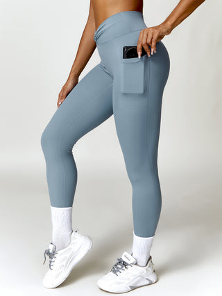 Shop Light Blue Twisted High Waist Active Pants with Pockets - High-Quality U.S. Made Women’s Fashion with Free & Fast Shipping