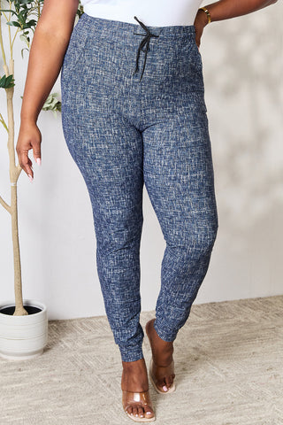 Shop LOVEIT Heathered Drawstring Leggings with Pockets - High-Quality U.S. Made Women’s Fashion with Free & Fast Shipping