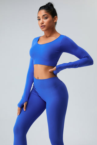 Shop Blue Cutout Round Neck Long Sleeve Active T-Shirt - High-Quality U.S. Made Women’s Fashion with Free & Fast Shipping