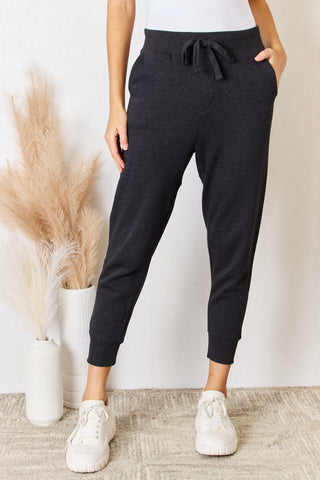 Shop Washed Black RISEN Soft Knit Drawstring Cropped Joggers - High-Quality U.S. Made Women’s Fashion with Free & Fast Shipping