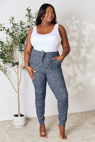 Shop LOVEIT Heathered Drawstring Leggings with Pockets - High-Quality U.S. Made Women’s Fashion with Free & Fast Shipping