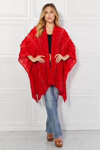 Shop Justin Taylor Pom-Pom Asymmetrical Poncho Cardigan in Red - High-Quality U.S. Made Women’s Fashion with Free & Fast Shipping