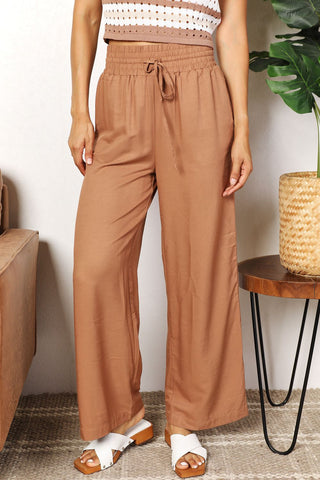 Shop Camel Double Take Drawstring Smocked Waist Wide Leg Pants - High-Quality U.S. Made Women’s Fashion with Free & Fast Shipping