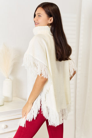 Shop Justin Taylor Turtle Neck Fringe Poncho - High-Quality U.S. Made Women’s Fashion with Free & Fast Shipping