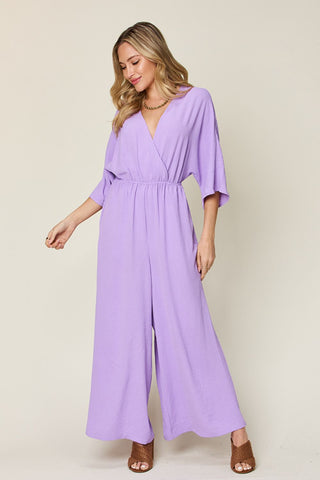 Shop Lavender Double Take Full Size Surplice Wide Leg Jumpsuit with Pockets - High-Quality U.S. Made Women’s Fashion with Free & Fast Shipping